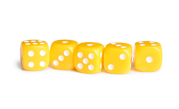 Many yellow game dices on white background