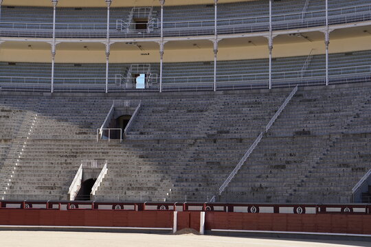 Empty Sand Arena and Red Barrier at Plaza de Toras Las Ventas Bullring Interior, Madrid, Spain