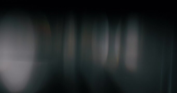 Explore the captivating world of light reflections from prisms in this stunning abstract footage collection, ideal for designers and motion graphics artists seeking unique inspiration