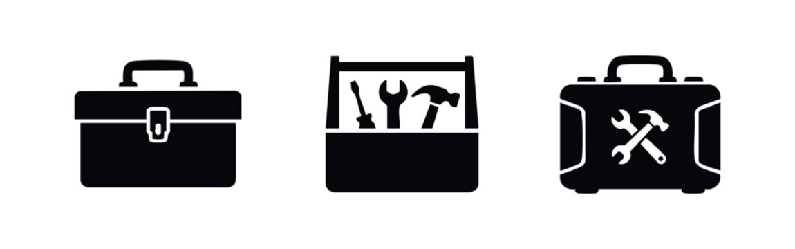 Set of black toolbox icons featuring a classic closed case, an open tool tote with hand tools, and a modern equipment carrier on white background.