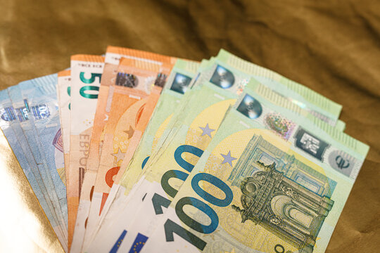 Close up of Euro banknotes fanned out, representing money, finance, investment, and wealt