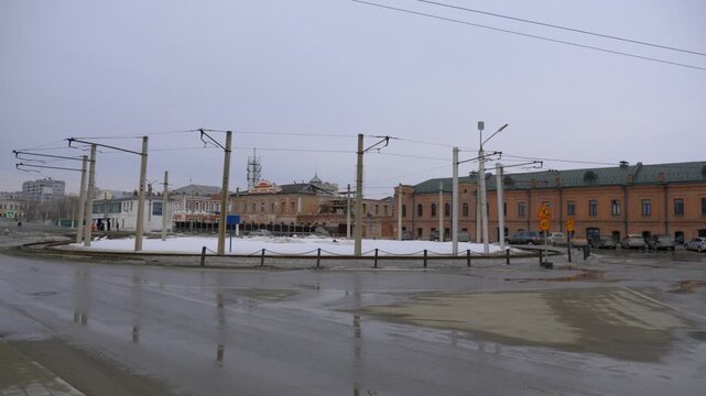 March 22 2026 Barnaul Russia tram terminal loop at Old Bazaar covered in snow cold early spring urban cityscape public transport and winter atmosphere.
