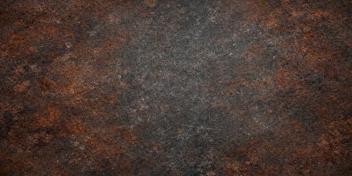 A weathered vintage background featuring a rough rusty metal texture and brown grungy iron surface material with aged metallic corrosion patterns on an old steel wall