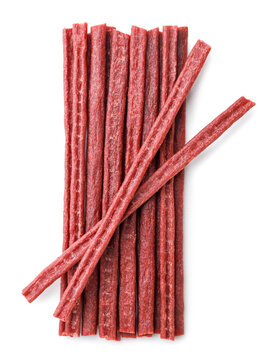 Fish jerky sticks on a white background. Top view