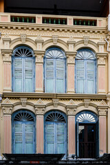Fototapeta premium Architectural detail of ornate, colorful, traditional, old, colonial-era homes and buildings in Singagpore.