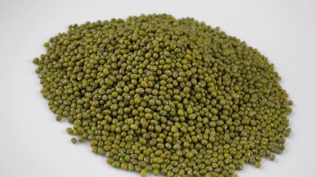 Rotating Mung Beans on White Background for Food Ingredient Motion Concepts