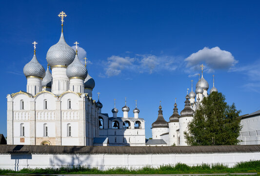 View of the medieval Assumption Cathedral, the belfry and the Resurrection Church behind the fortress wall of the monastery in Rostov the Great