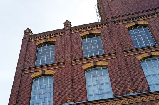Industrial building (spinning mill), Historicism, 1905, Gescher, NRW, Germany, Vintage industrial brick building facade with large arched windows.