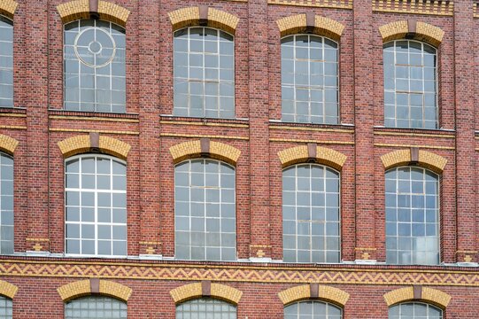 Industrial building (spinning mill), Historicism, 1905, Gescher, NRW, Germany, Red brick building facade with industrial windows pattern.