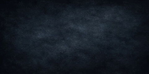 Fototapeta premium A dark blue grunge background features a textured vintage wall pattern with an aged black paper surface and rough dirty backdrop design