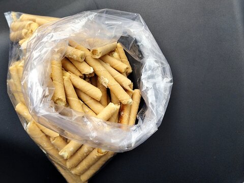 A clear plastic bag contained a large quantity of semprong, or egg roll, cakes