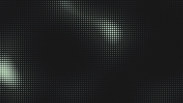 Halftone pattern creating a gradient effect with small light green dots on a dark background