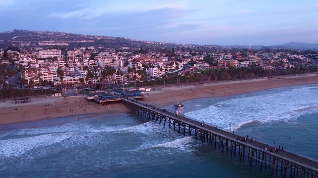 San Clemente, California. Panorama 360 view of Long Coastal Pier Overlooking Horizon at Sunset. Looking South and North to Dana Point, Orange County.