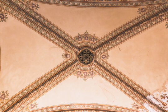 Intricate decorative arched ceiling with historical frescoes in central Vienna.