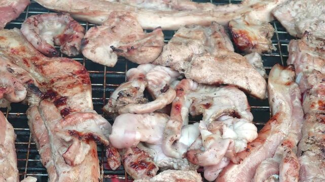 Pork grilled over charcoal.