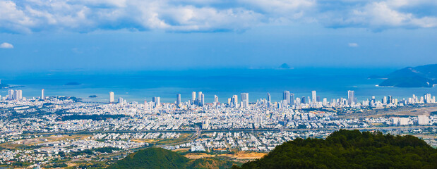 Panorama of Nha Trang city in Vietnam from top of mountain. Panoramic view of Nha Trang city from above from a drone © alexkoral