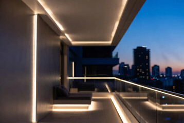 Obraz premium A modern balcony with recessed lighting and a city skyline view.