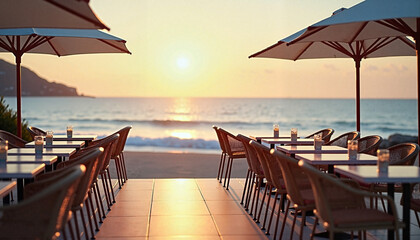 Fototapeta premium Seaside cafe tables under umbrellas in romantic sunset mood by ocean with copy space
