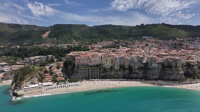 Aerial drone flight along Tropea coast in opposite direction, Calabria, Italy