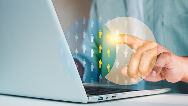 Niche marketing and personalization concept. Marketing segmentation strategy and consumer analysis. Marketer using laptop with venn diagram to analyze target customer data. selecting audience