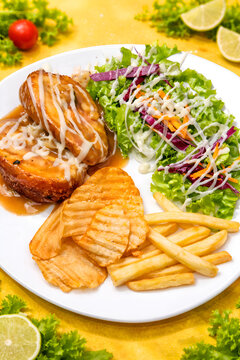 Grilled Chicken Plate with Fresh Salad, Fries, and Crispy Chips
