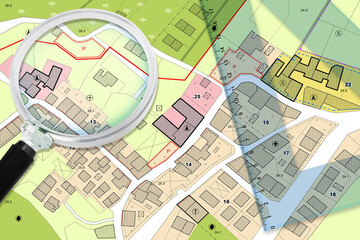 Naklejka na ściany i meble Plastic set square and magnifying glass over an imaginary General Urban Plan - 3D render concept image with copy space - note: the map is totally invented and does not represent any real place