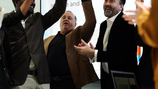 Business meeting applause with diverse professional group office teamwork and collaboration, celebrating success through presentation, cooperation, support, unity, and joyful clapping conference