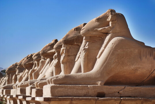 Alley Swing with heads of rams in the temple of Karnak Egypt, as well as several avenues of goddess and ram-headed sphinxes connecting the Precinct of Mut, the Precinct of Amun-Re, and the Luxor Templ