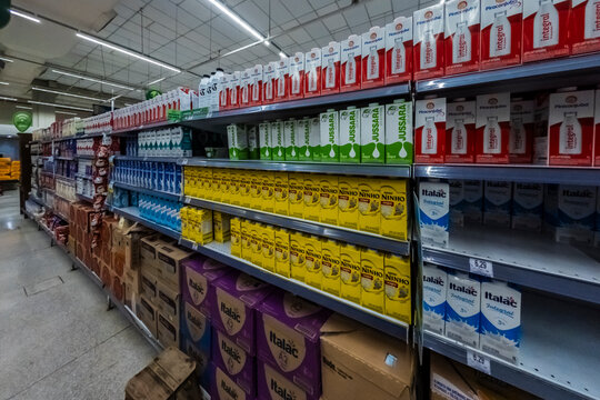 Sao Paulo, Brazil, April 13, 2026. Shelves in a Brazilian supermarket fully stocked with cartons of UHT milk from various national brands. 