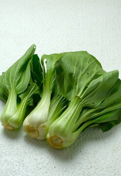 Fresh Pak Choy or Bok Choy Isolated on White Background. Ideal for Asian Cuisine, Healthy Dieting, and Organic Vegetable Concepts..Sawi Sendok