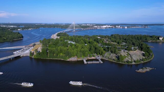 Beautiful drone footage of Korkeasaari Island in Helsinki, Finland during a sunny summer day.
