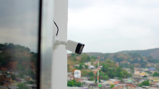 Reinforced home surveillance: CCTV camera discreetly installed on the balcony, ensuring 24/7 security. CFTV