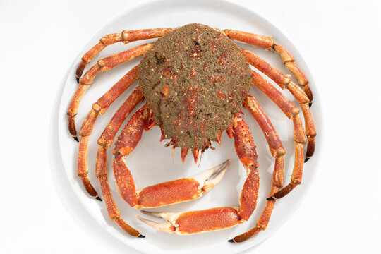 Top view of a Fresh Spider crab or king crab on plate on white background. maja brachydactyla