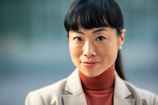 Confident business professional woman portrait outdoors