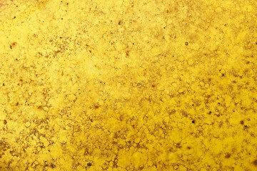 Yellow grunge wall texture. Rusty painted surface closeup. Abstract weathered background view. Rough stained material pattern. Old industrial color detail. Vintage worn backdrop scene. © Paweł Michałowski