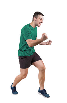 Full length portrait of a male athlete holding fists tight, celebrating victory and success with a joyful grin. Triumph and achievement concept with a sporty guy isolated on transparent background