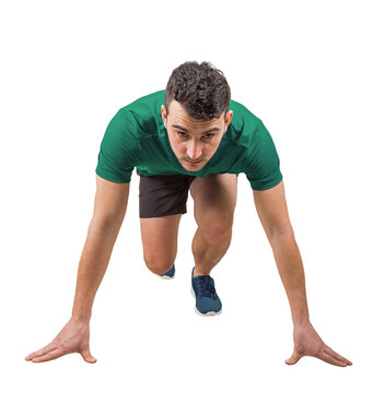 Athletic man crouches in a low starting position, full length portrait isolated on background. Intense, focused gaze of anticipation right before the sprint