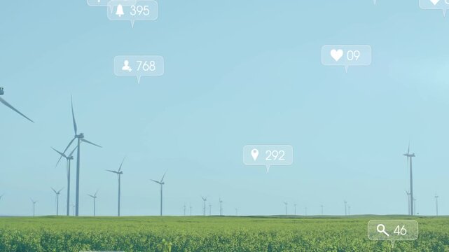 Wind farm holding frame as badges appearing from sky, drifting over turbines, mapping energy buzz