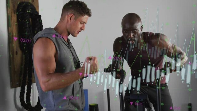Trainer checking timer and cueing client pedaling, animated fitness chart tracking effort