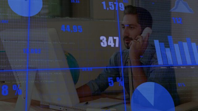 Male analyst using desktop blue finance charts overlaying, hearing cue picking phone calling client