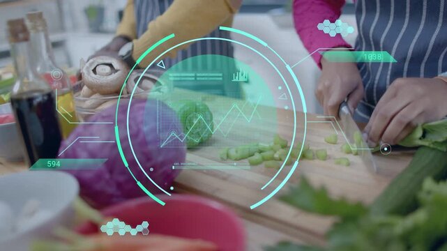 Two cooks slicing veg after placing knife, prepping meal, teal-HUD overlaying board showing charts