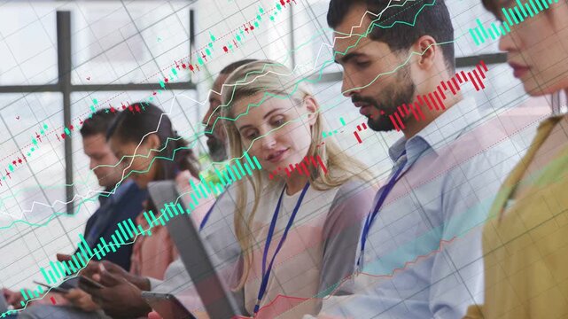 Central pair leaning, man scrolling laptop, reviewing data causing animated finance charts sweeping
