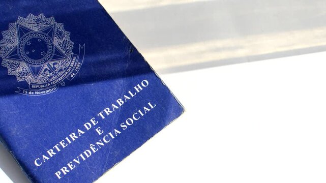 Brazilian work permit on a white surface, symbolizing opportunities and professional stories. Brazilian work permit on a white surface, an essential document for Brazilian professional narratives.