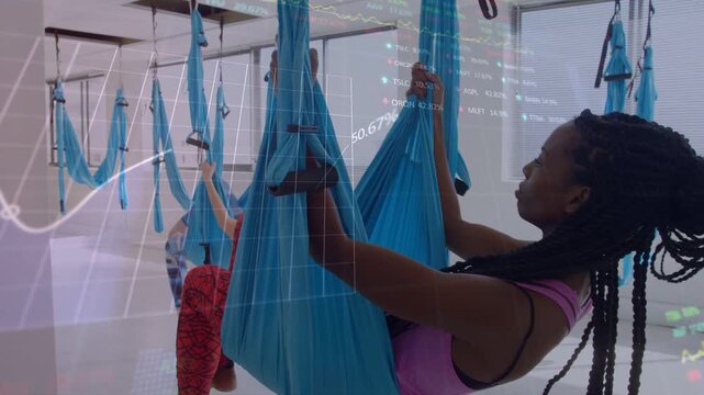 Braided woman gripping hammock tucking shifting flat in fitness charts peaking then fading on shots