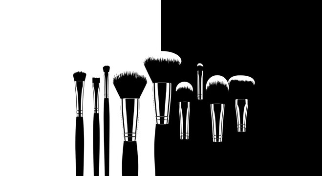 Makeup brushes set with various black and white silhouettes and silver ferrules for professional makeup application