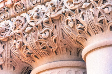 Fototapeta premium Intricately carved stone capital with floral detail. Colonial heritage architecture, Toronto, Canada