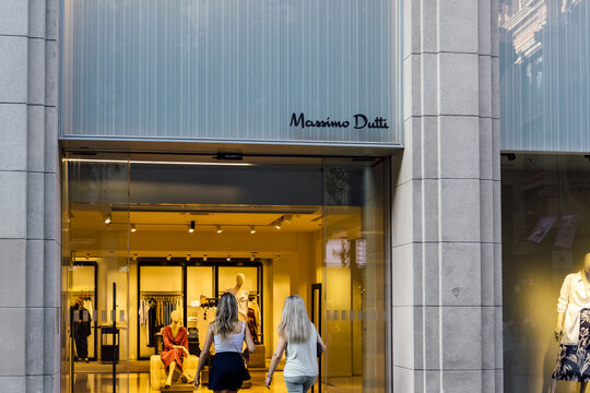 Barcelona, Spain - July 17, 2021. Logo and facade of Massimo Dutti, a Spanish clothing manufacturer that is part of the Inditex group.