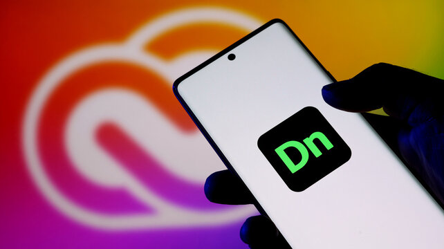 Adobe dimension app icon displayed on a smartphone screen