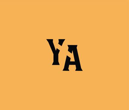 A stylized lowercase YA in black letters weaving style with one letters partially on top of the other on a burnt orange background