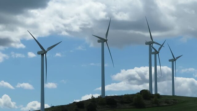Rotating wind turbines , a symbol of clean and sustainable energy , Navarra , Spain .
April 16 , 2026